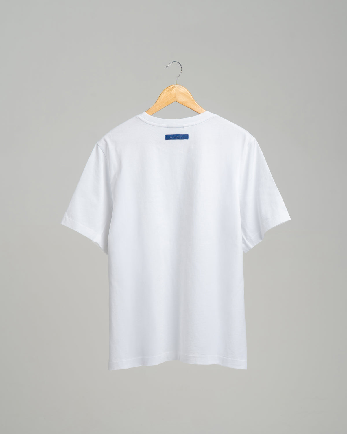 White SELECT DISTINCT ORIGIN Essentials No.1 T-shirt in 100% organic cotton, back view on male model.